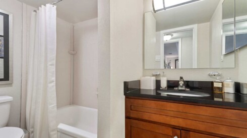 Bathroom with fixtures and appliances