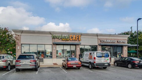 Shopping center with tropical smoothie cafe and Starbucks coffee shops
