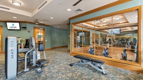 Exercise room with weight lifting equipment