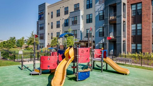 Outdoor playground at the Windmill Parc apartments