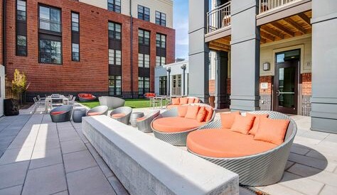 Outdoor courtyard seating at the Windmill Parc apartments